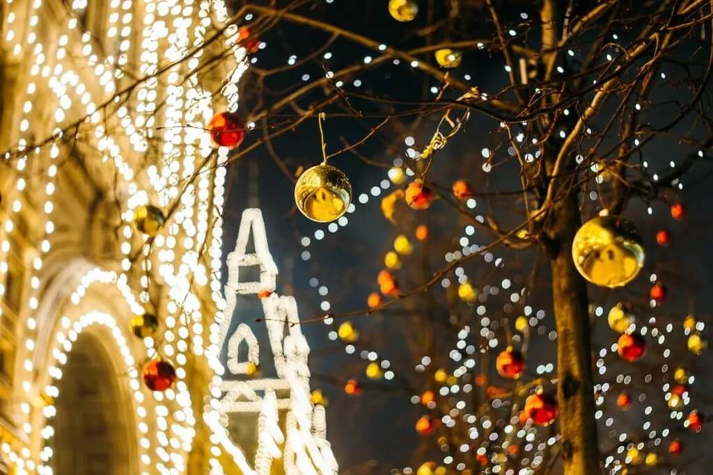 tree decor and christmas lighting in background