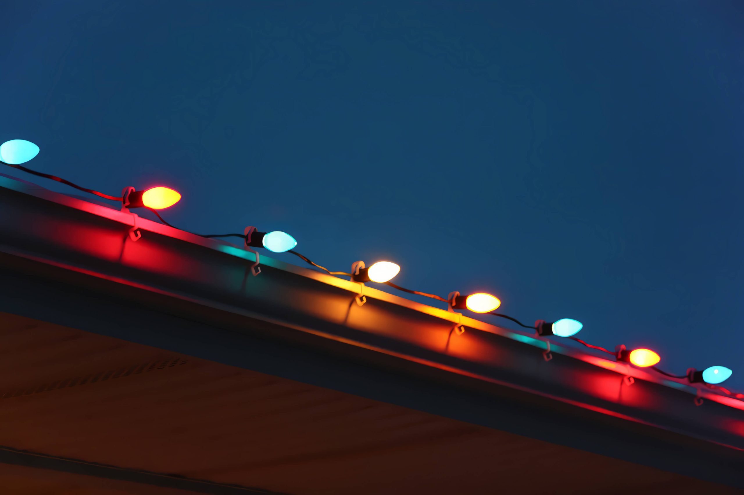 holiday lighting installed in roofline