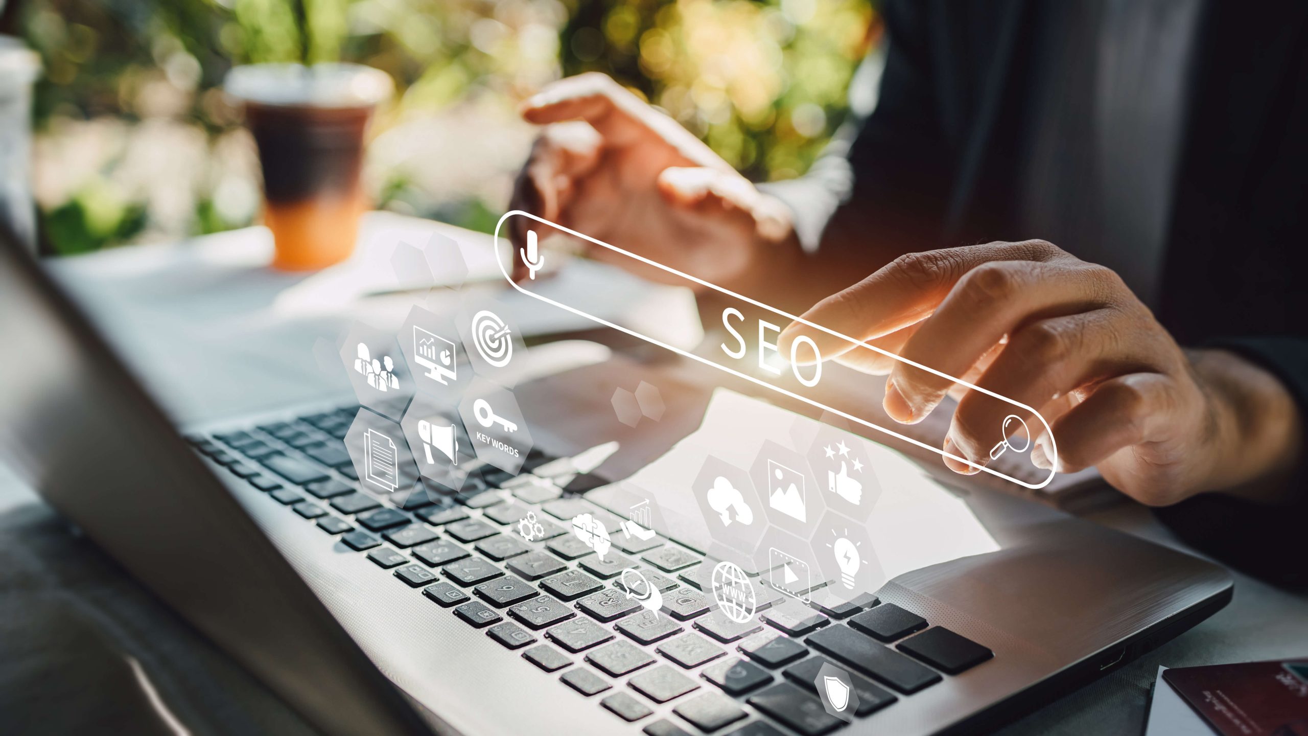 Person working with computer laptop for manage search engine optimization